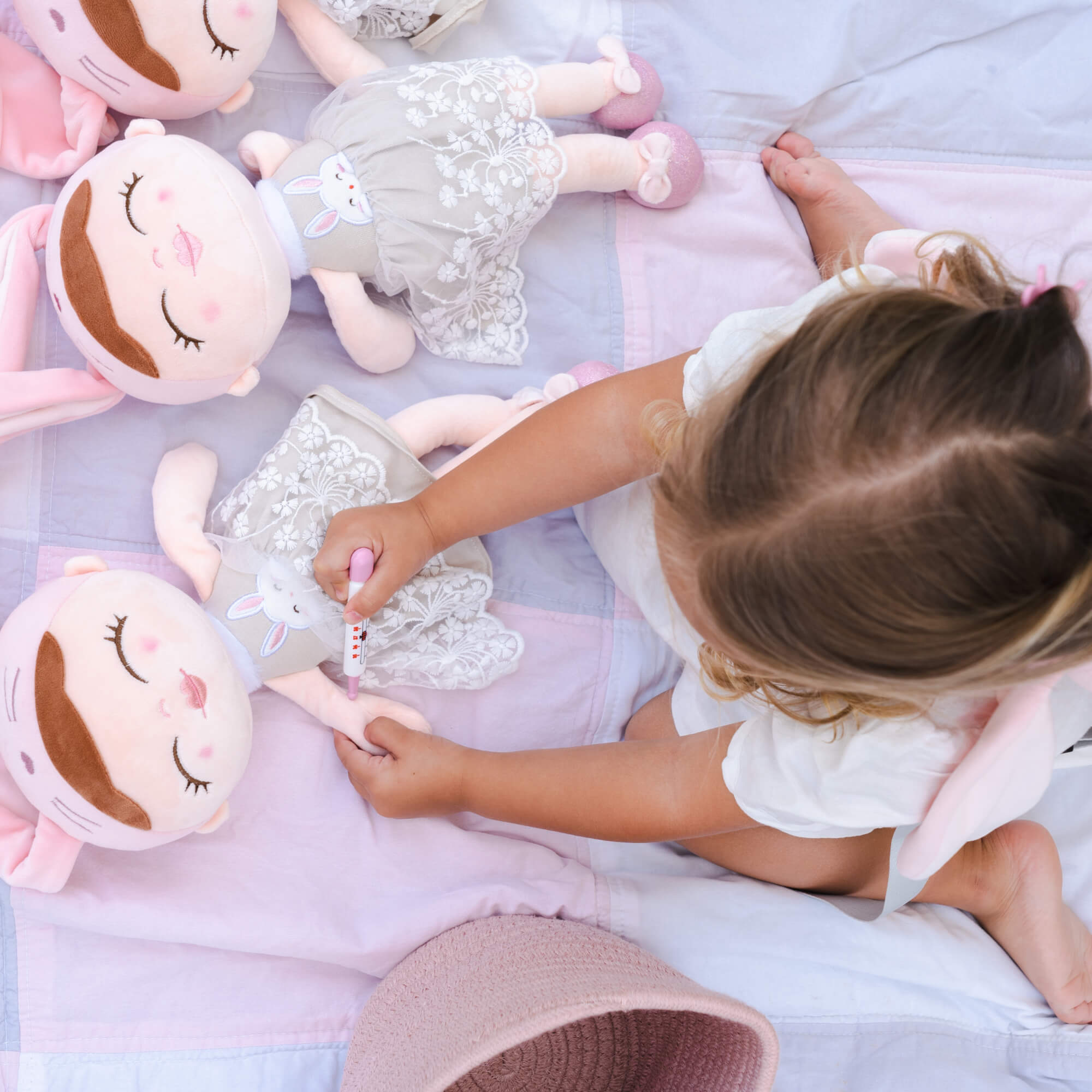 Child playing with Dreambaby rag doll super soft plush rabbit